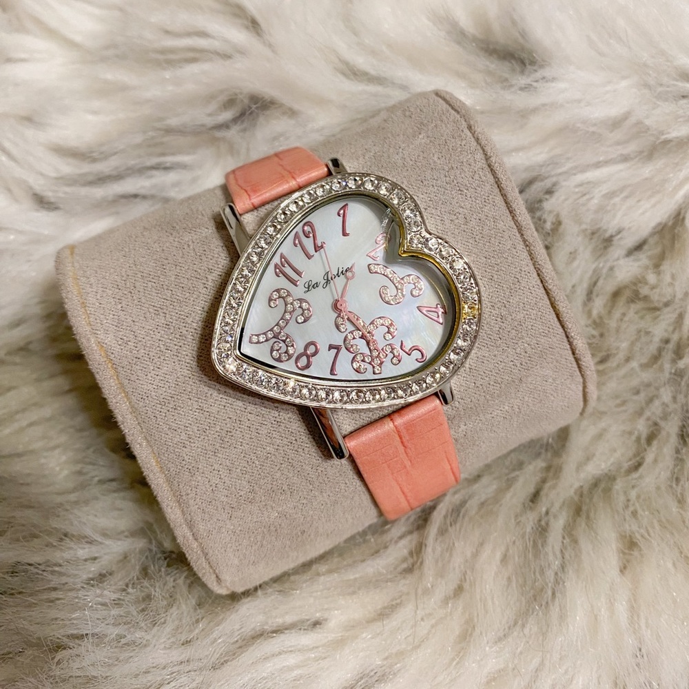 Vintage early 2000s La Jolie pink and silver rhinestone warped watch